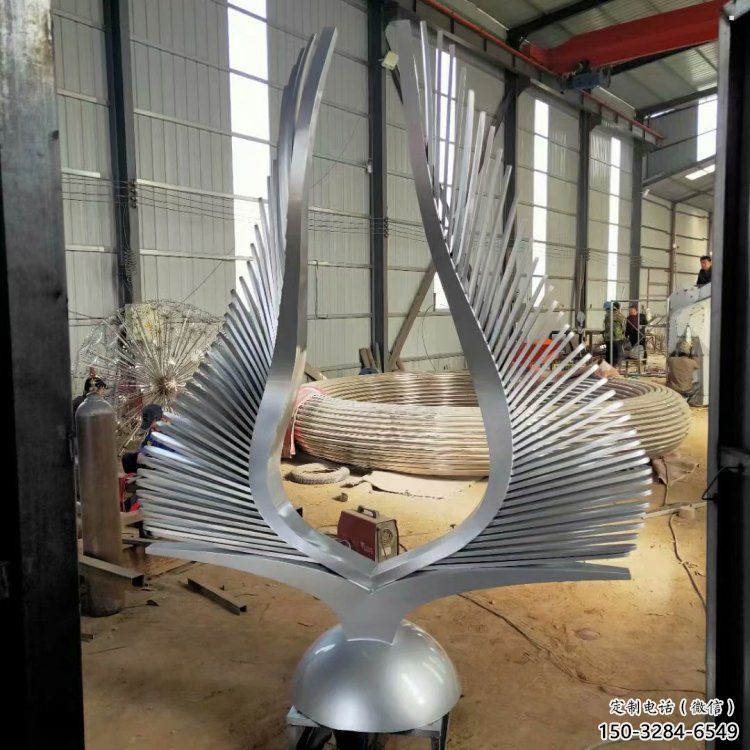 步行街翅膀雕塑，鍛造景觀雕塑，鏤空方式